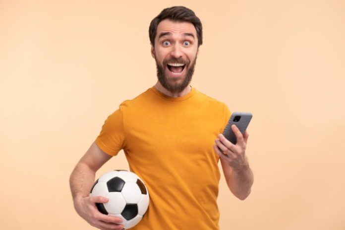 genérica homem celular futebol